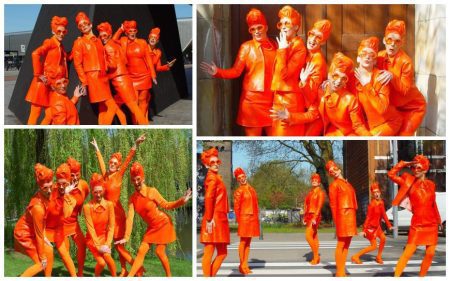 Oranje Dames: Levendige animatie vol kleur voor ontvangst, festivals & beurzen. Boek nu voor een feestelijke explosie!