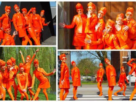 Oranje Dames: Levendige animatie vol kleur voor ontvangst, festivals & beurzen. Boek nu voor een feestelijke explosie!