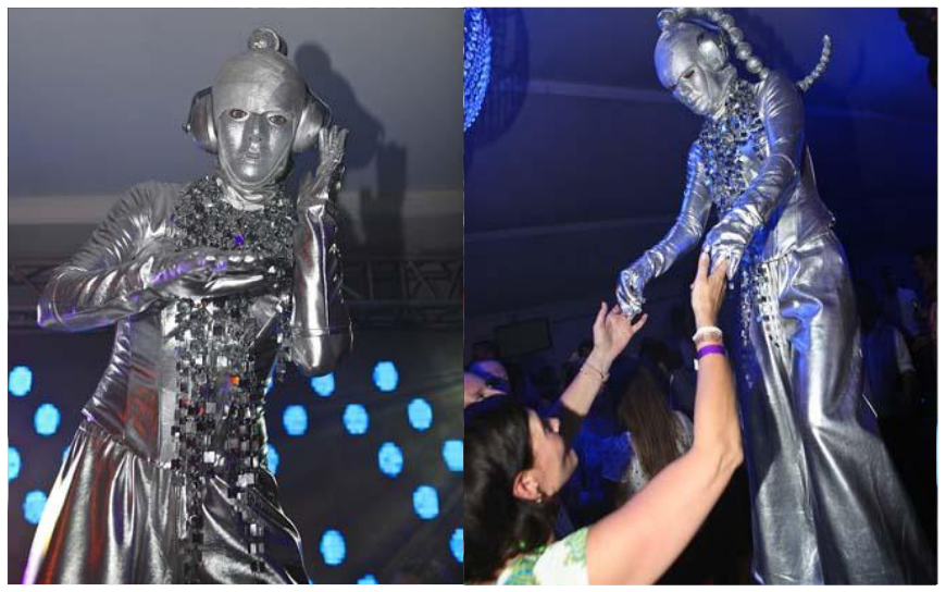 Alien Zilver Steltenlopers brengen futuristische, buitenaardse magie naar elk event. Met glinsterende kostuums en mysterieuze interactie zijn ze perfect voor festivals, winkelcentra en space-thema’s.