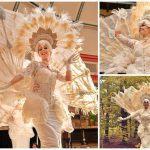 Boek de betoverende Elegante Witte Pauwen Steltenlopers voor jouw evenement. Prachtige parade met verlichte staart, ideaal voor festivals en bruiloften!