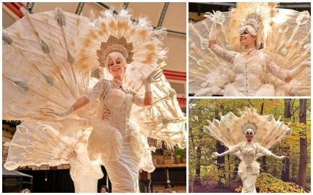 Boek de betoverende Elegante Witte Pauwen Steltenlopers voor jouw evenement. Prachtige parade met verlichte staart, ideaal voor festivals en bruiloften!