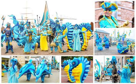 Dompel je onder in de magie van de Parade van Neptunus! Betoverend straattheater en ontvangst entertainment met kleurrijke zeedieren en dansende waterelfjes.
