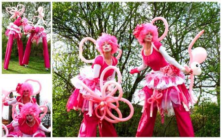 Betoverende Roze Circus Clowntjes Steltenlopers: Kleurrijk vermaak voor evenementen. Interactieve vreugde en charme voor kinder- en circusfeestjes.
