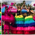 Betoverende Kleurrijke Regenboog Steltenlopers: Breng de zon naar uw evenement met levendige kleuren en interactief entertainment!