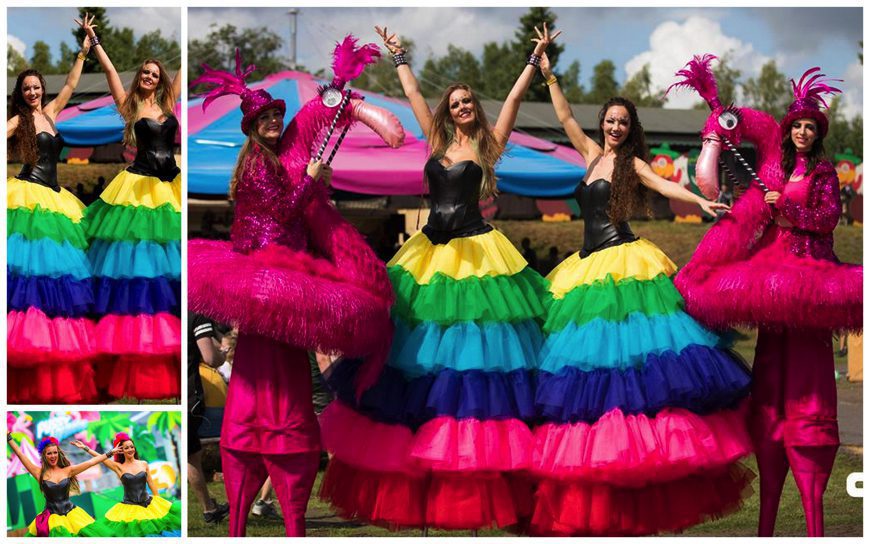 Betoverende Kleurrijke Regenboog Steltenlopers: Breng de zon naar uw evenement met levendige kleuren en interactief entertainment!