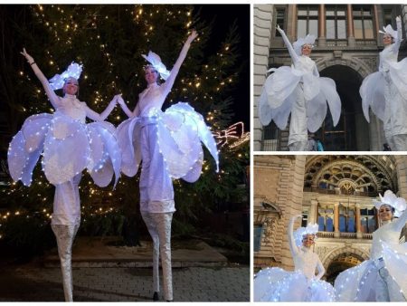 Betoverende Witte LED Bloemen Steltenlopers. Betoverend Kerst- en Wintervermaak met Majestueuze Steltenlopers. Voeg Magische Lichtsfeer Toe aan Uw Evenement!