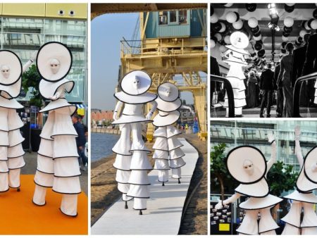 Circle Mania Steltenlopers Wit: Elegante figuren in het wit voor betoverend entertainment op uw event! Flexibele speeltijd en LED-optie beschikbaar.