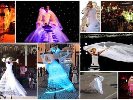 Ervaar de betovering met Engel van Licht Steltenlopers - Een hemels lichtspektakel voor elk evenement! Boek nu voor magie op maat.